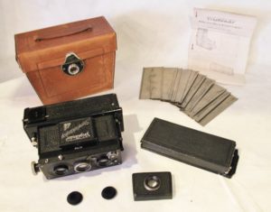 The camera is a very rare 1923 Voigtländer Stereflektoskop housed in a custom leather case and inscribed with “M. R. Wilson – Detroit.”
