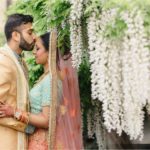 Indian Groom kisses his Bride's forehead at Meadow Brook.