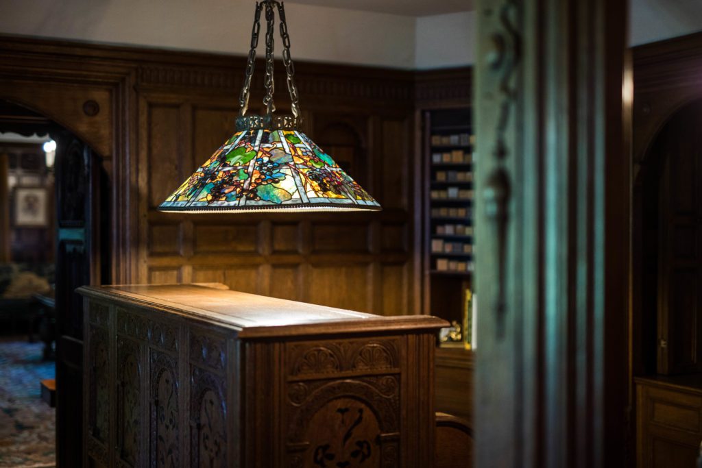 Original chandelier lamp by Louis Comfort Tiffany hung at Meadow Brook Hall.