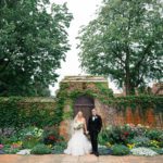 Bride and Groom in front of Meadow Brook's English Walled Garden
