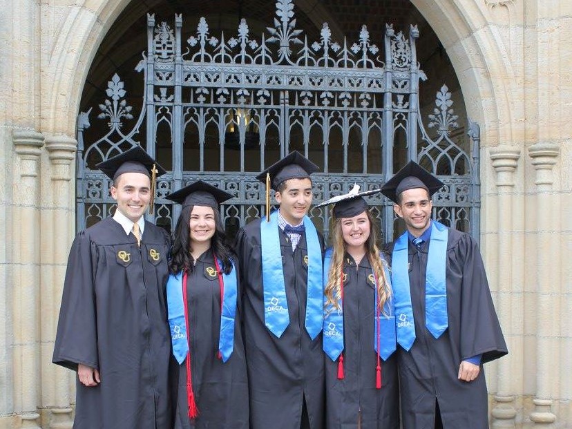 Graduates pose at Meadow Brook Hall