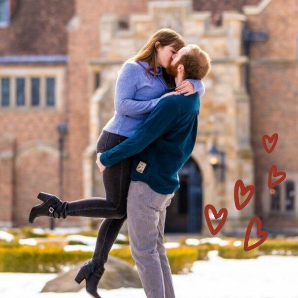 Engaged Couple poses in front of Meadow Brook Hall