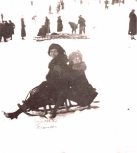 Matilda Dodge Wilson and Frances Dodge share a toboggan ride