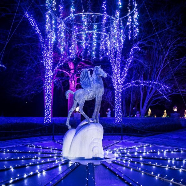 Pegasus fountain decorated in holiday lights