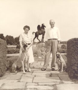 Alfred and Matilda Wilson in front of the Colt Pegasus Fountain at Meadow Brook Hall in 1960.
