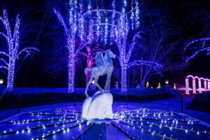 Meadow Brook Hall's Colt Pegasus Fountain lit up for Winter Wonder Lights during the Holidays at Meadow Brook.