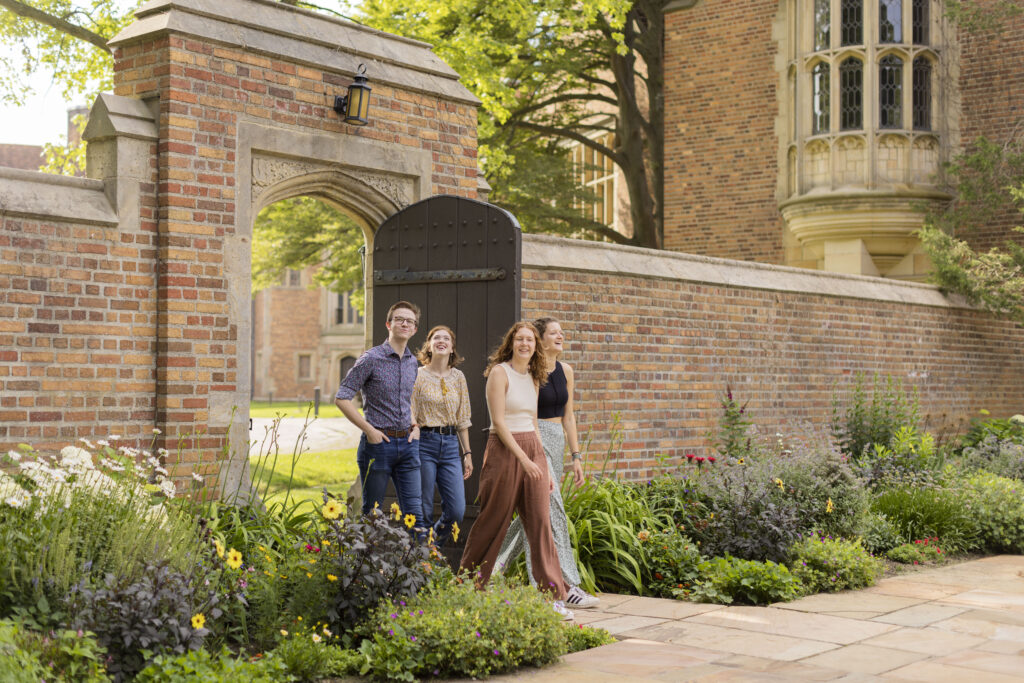 Four Students walk into the English Garden