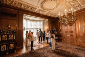 Guests tour historic Meadow Brook Hall in Rochester, Michigan.