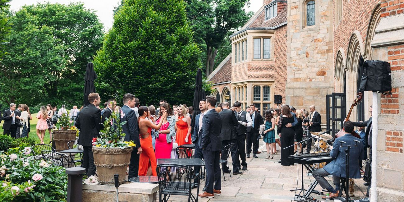 Guests at a Meadow Brook Hall gathering.