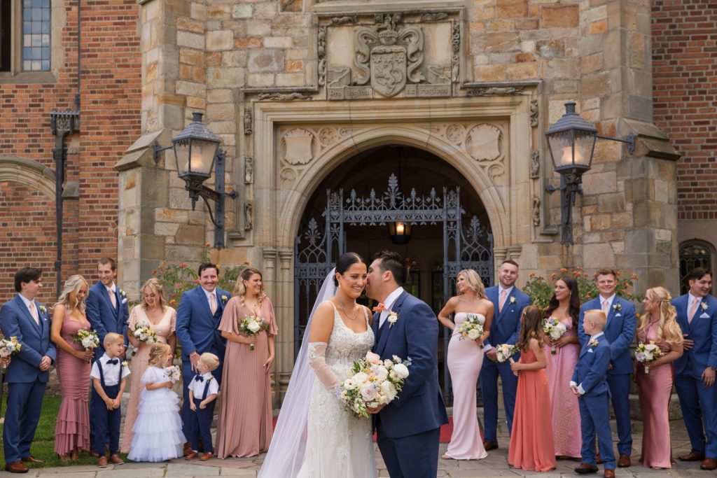 Wedding party in front of Meadow Brook Hall in a full array of colors