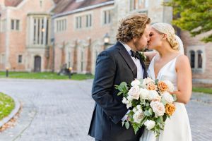 Couple gets married at Meadow Brook Hall in Rochester, Michigan.