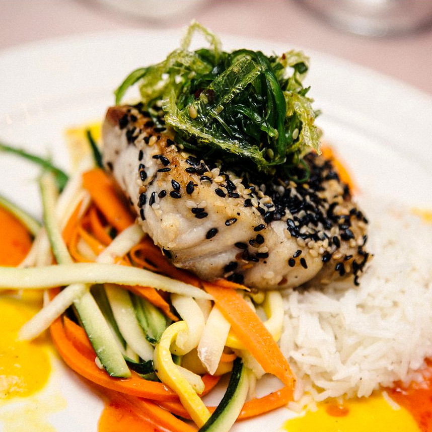 Close up image of colorful plated entree at Meadow Brook Hall.