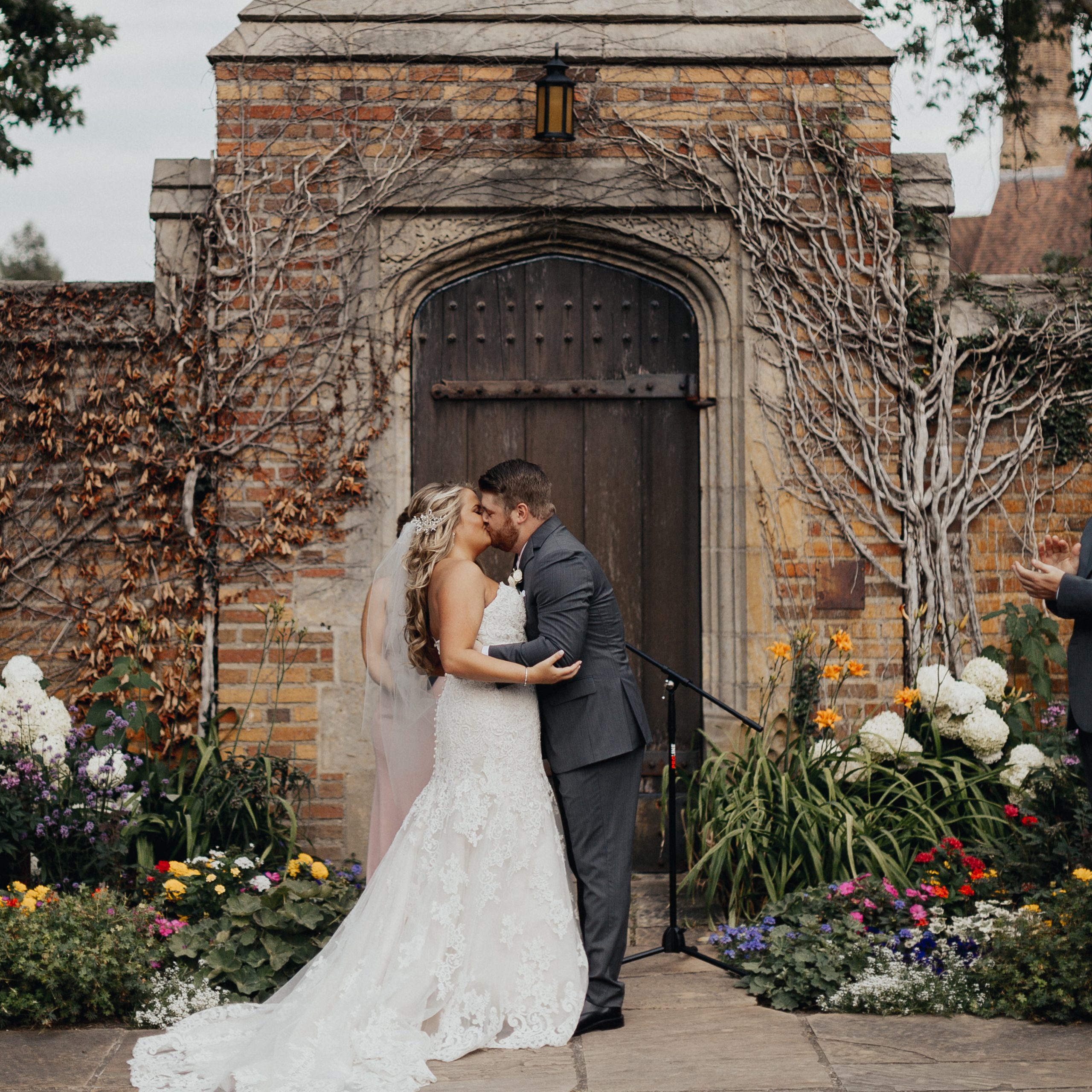 Bride and Groom kiss at their wedding at Meadow Brook Hall