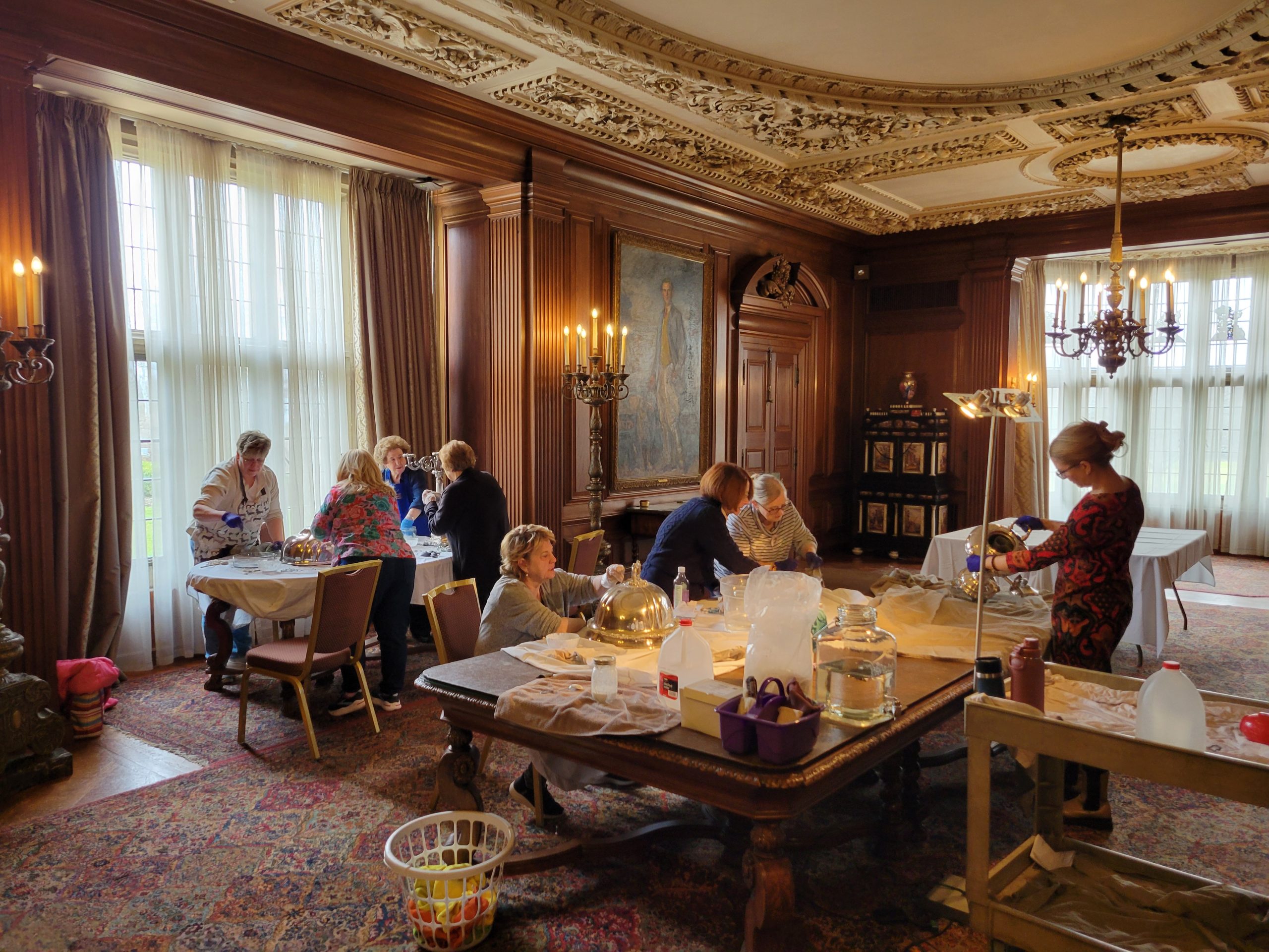 Volunteers at Meadow Brook Hall polish the historic silver.