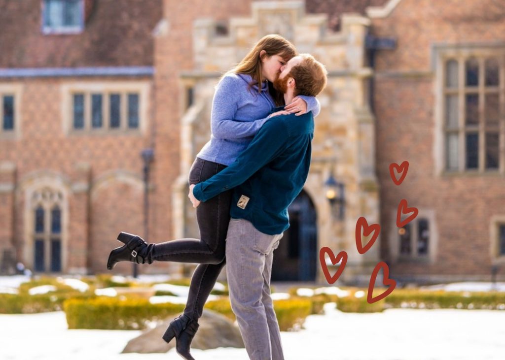 Engaged Couple poses in front of Meadow Brook Hall