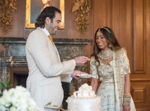 A bride and groom in the Christopher Wren Dining Room at Meadow Brook Hall.