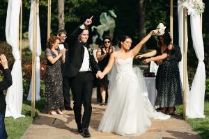 Couple walks down aisle