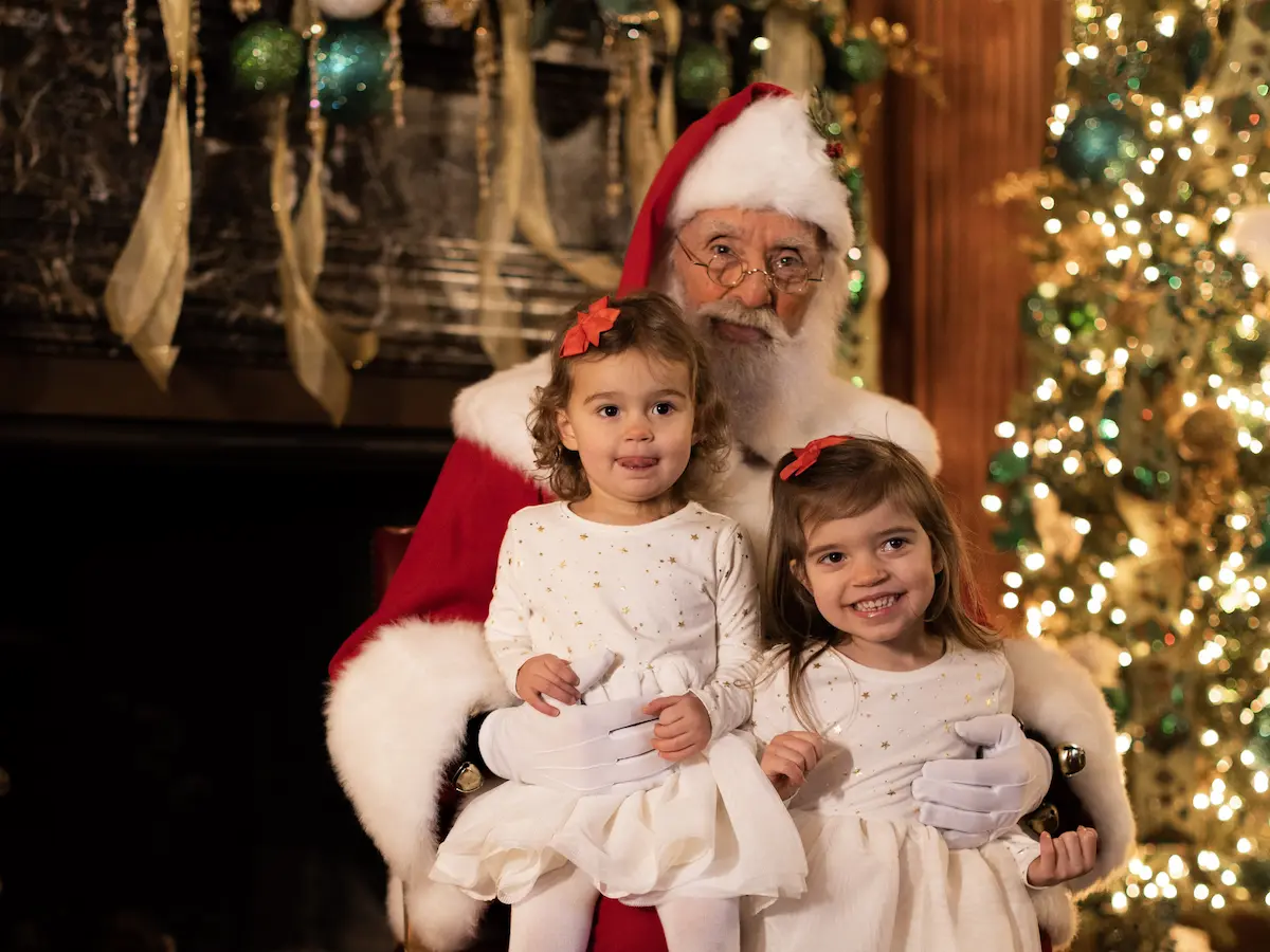 Children share their Christmas wishes with Santa at Meadow Brook Hall.