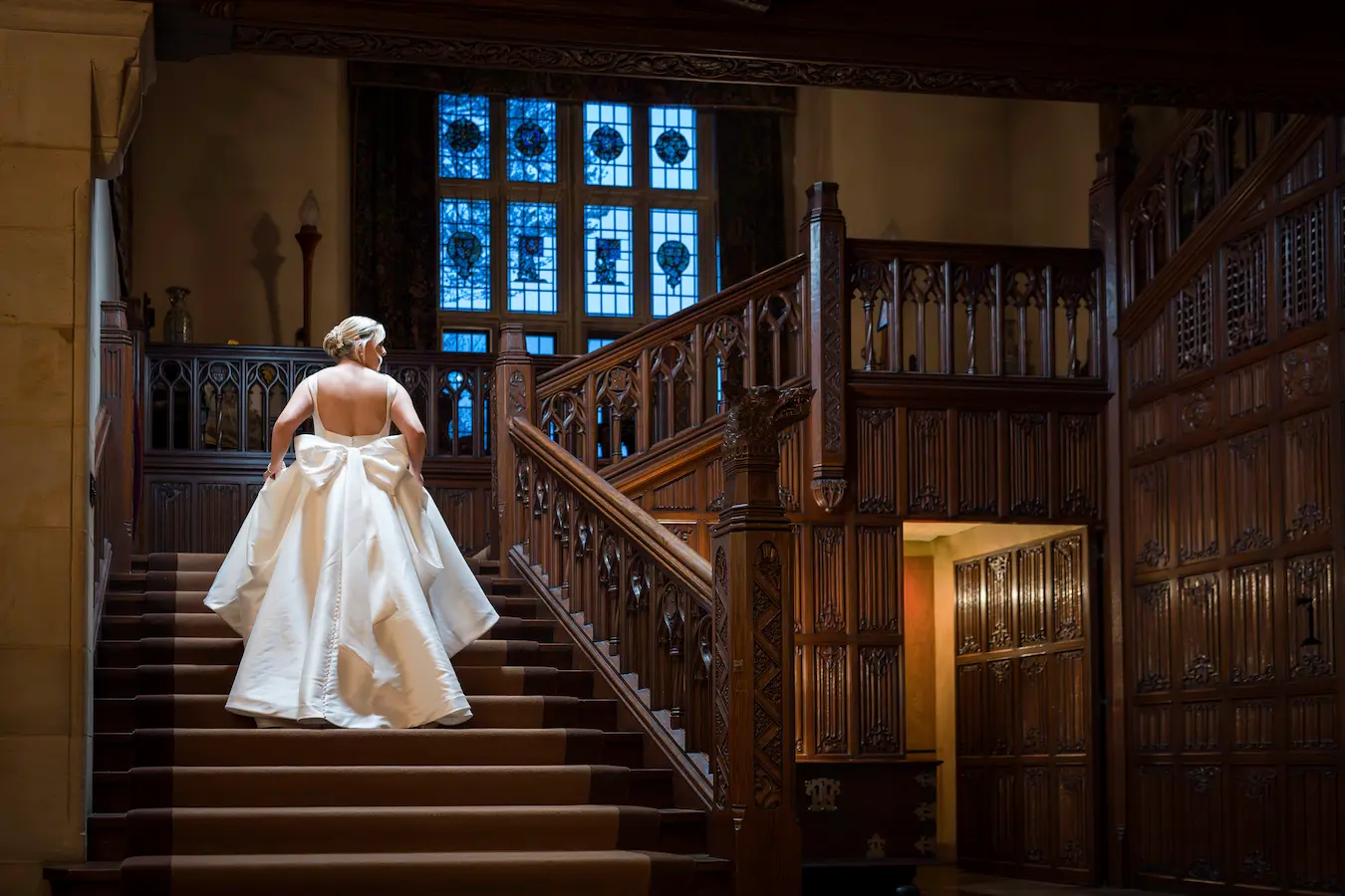 Bride on the Grand Staircase at Meadow Brook on her wedding day